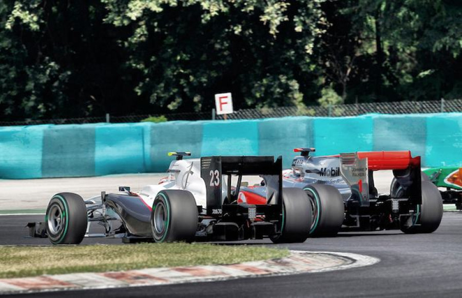 F1 cars on corner